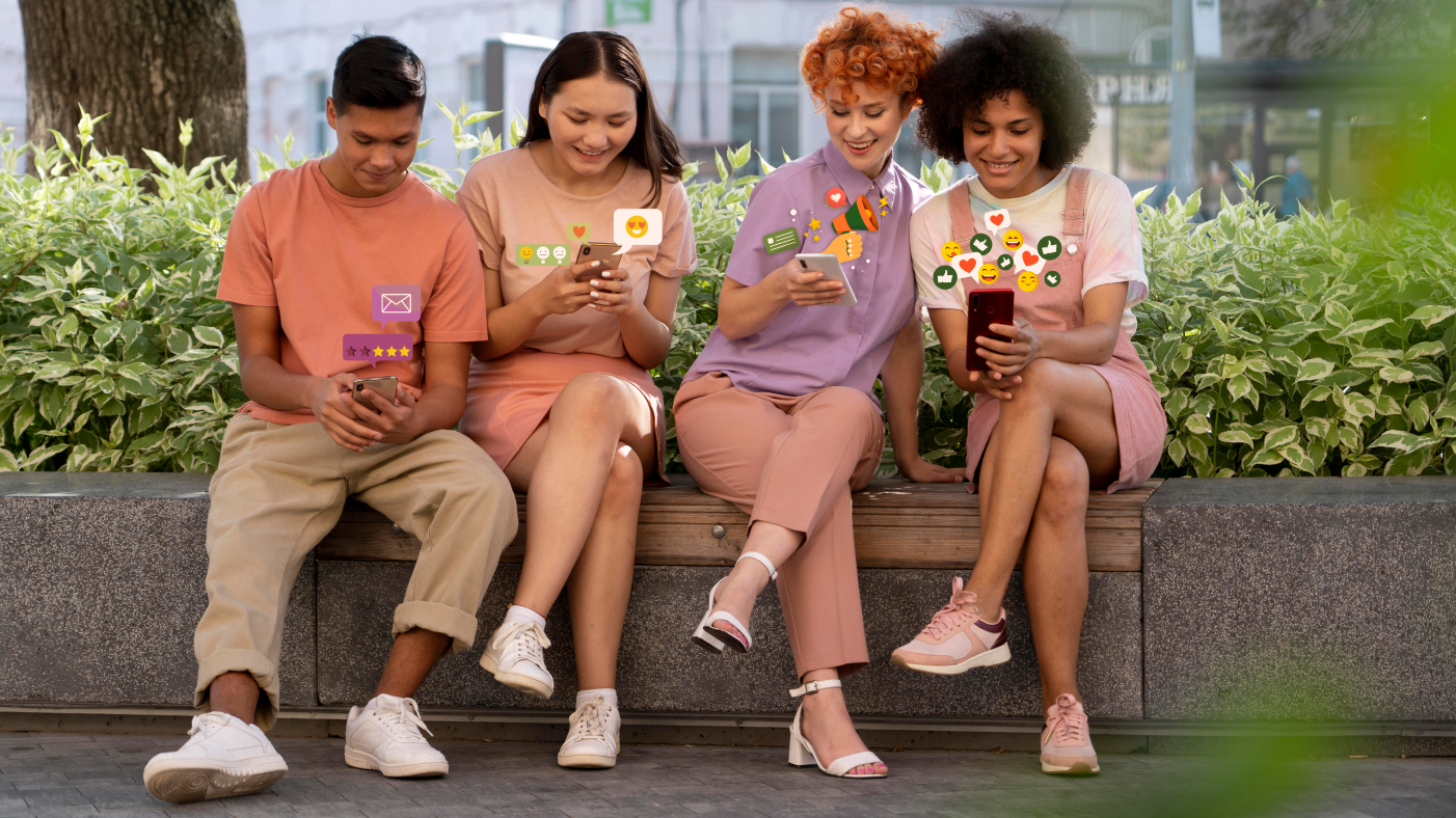 Young people looking at their phones